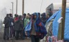 Người tỵ nạn tại khu trại ở Calais (Pháp) - Ảnh: Philippe Wojazer (AFP)
