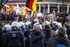 Cảnh sát chống bạo động tại cuộc biểu tình hôm 9-1 tại TP. Köln của tổ chức cực hữu Pegida - Ảnh: Christoph Hardt (AFP)