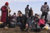 Người tỵ nạn trên đường sang Đức tại biên giới Serbia, tháng 1-2016 - Ảnh: Armend Nimani (AFP)