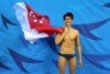 Kình ngư trẻ tuổi người Singapore đã vượt mặt huyền thoại Michael Phelps trong phần thi bơi 100m bướm nam - Ảnh: simplygiving.com