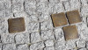 “Những viên đá cản đường” trên hè phố của nước Đức - Ảnh: Tác giả