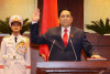 Tân thủ tướng Phạm Minh Chính trong lễ tuyên thệ nhậm chức Thủ tướng Chính phủ, Hà Nội ngày 5/4/2021 - Ảnh: TTXVN/ MTI