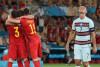 Siêu sao CR7 đau khổ trước niềm vui chiến thắng của đội tuyển Bỉ - Ảnh: Lluis Gene (AFP)