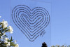 Đài tưởng niệm ở Nice hình trái tim kết bằng 86 cái tên của những nạn nhân mất ngày Quốc khánh 14/7/2016 - Ảnh: Jean François Ottonello (MAX PPP -Franc3 TV)