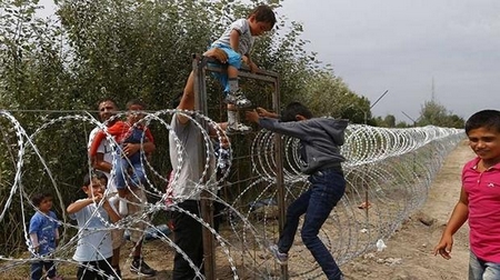 Khủng hoảng tỵ nạn là điểm nóng ở Châu Âu năm 2014 - Ảnh: www.trt.net.tr